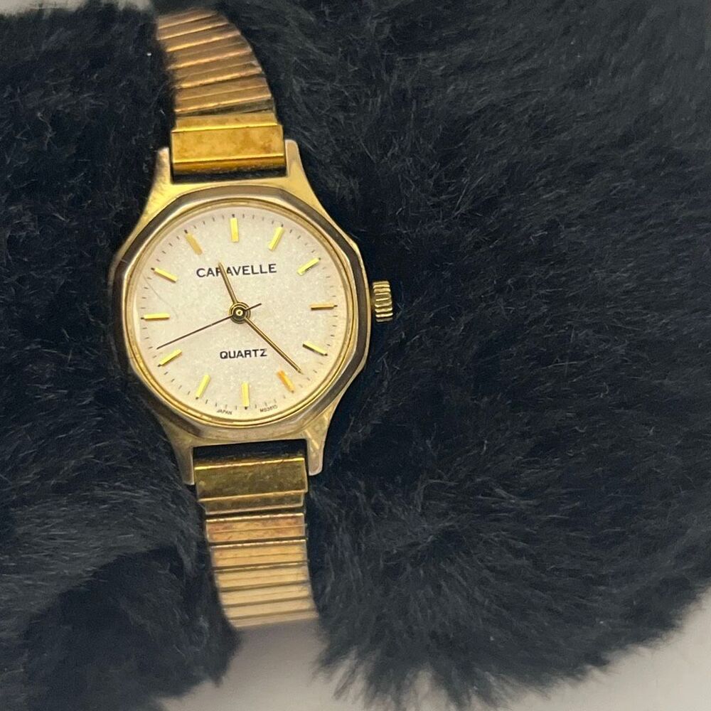 Caravelle Women's Gold Tone Quartz Stainless Steel Back Stretch Band Wristwatch